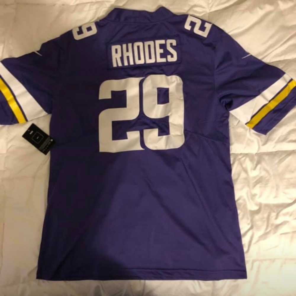 Brand new men’s Rhodes Vikings jersey, size large!
